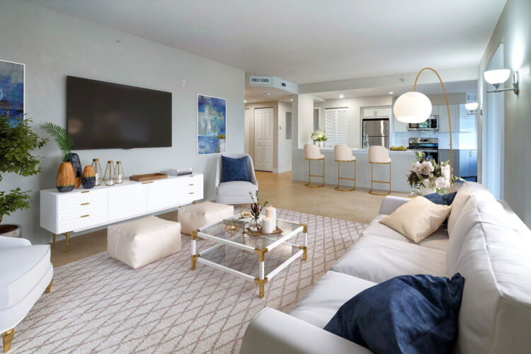 Apartment living room with white sofa and large windows at Heritage at Boca Raton