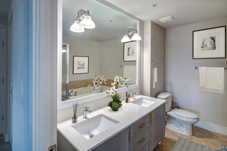 Apartment bathroom with double vanity at Heritage at Boca Raton