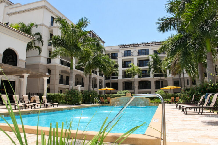 Pool deck facing the courtyard building at Heritage at Boca Raton
