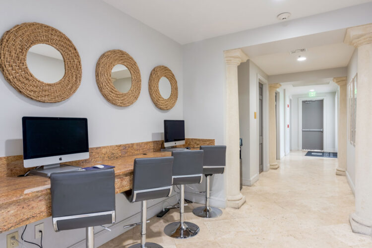 Business center with computer workstations at Heritage at Boca Raton